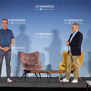 Andreas Pagel, Microsoft links und Michael Pohl, fleetXperts, rechts auf der Bühne der 1. CMxC